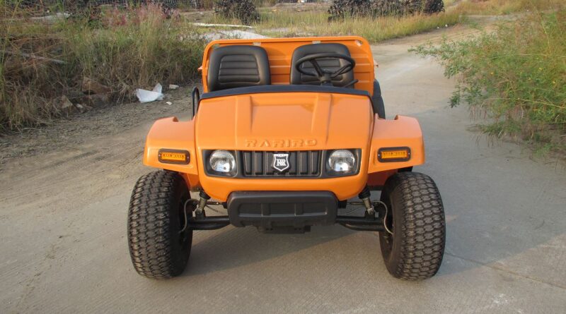 Electric utility vehicle turf gator for farm.